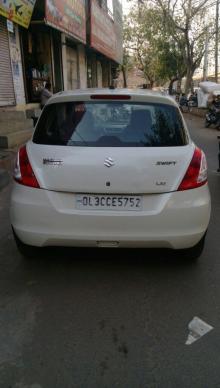 Maruti Suzuki Swift LXi Opt 2016