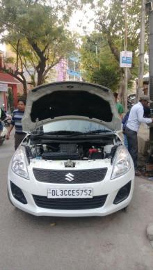 Maruti Suzuki Swift LXi Opt 2016