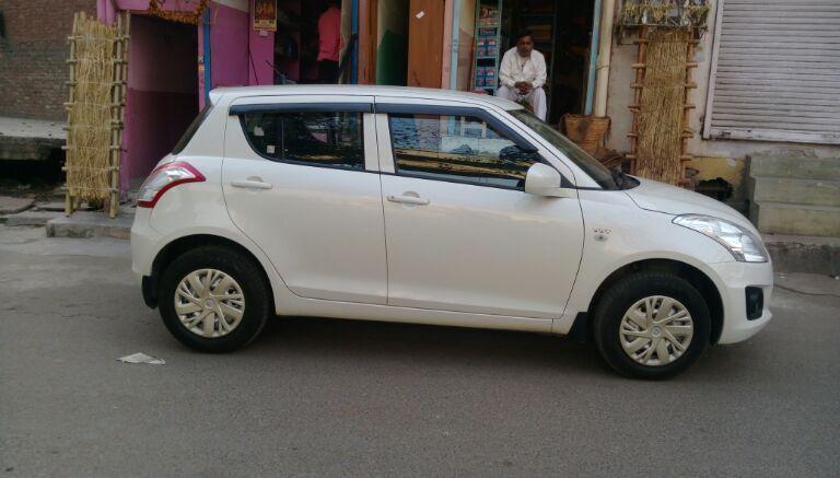 Maruti Suzuki Swift LXi Opt 2016