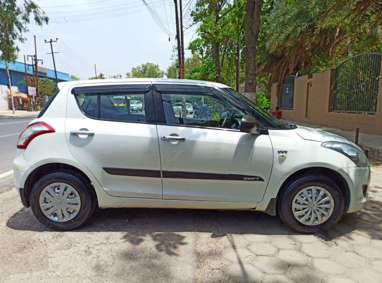 Maruti Suzuki Swift LXi Opt 2013