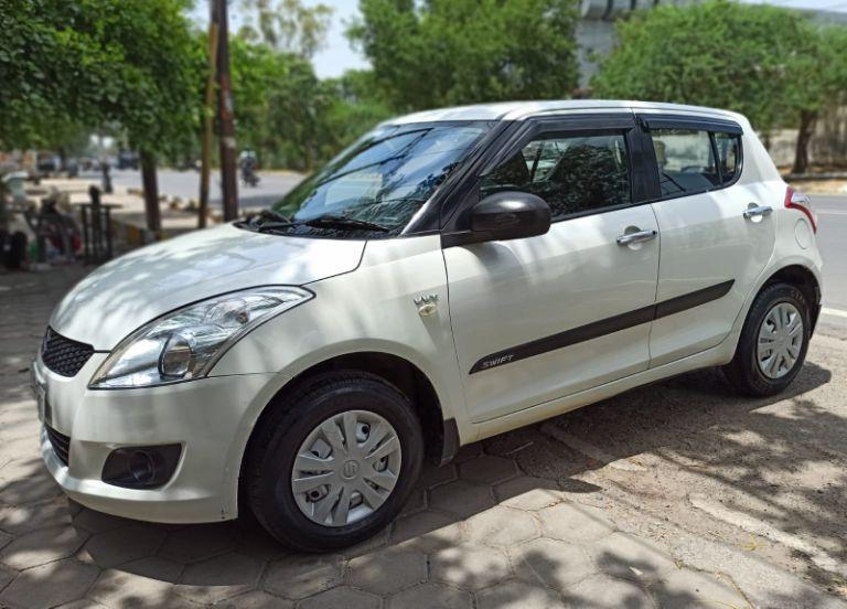 Maruti Suzuki Swift LXi Opt 2013