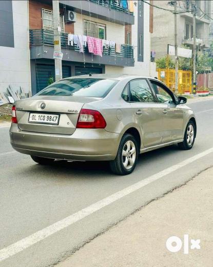 Skoda Rapid Ambition 1.6 TDI CR MT Plus Alloy 2014