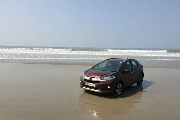 Red Color Honda WR-V Front Profile by Beach Side 