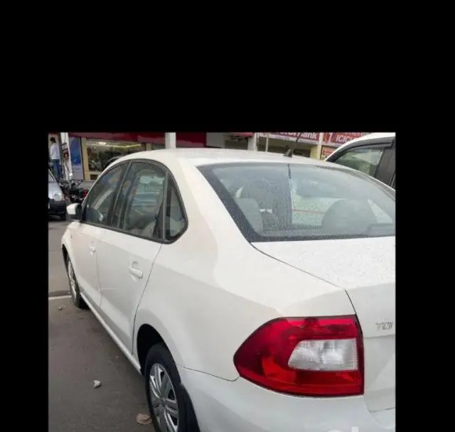 Skoda Rapid 1.6 MPI AMBITION AT 2013