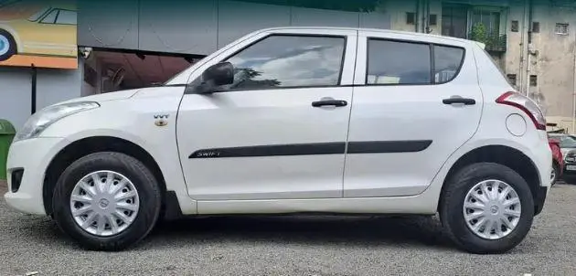 Maruti Suzuki Swift LXi 2014