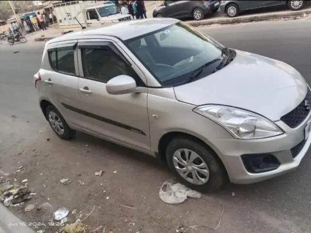 Maruti Suzuki Swift LXi Opt 2016